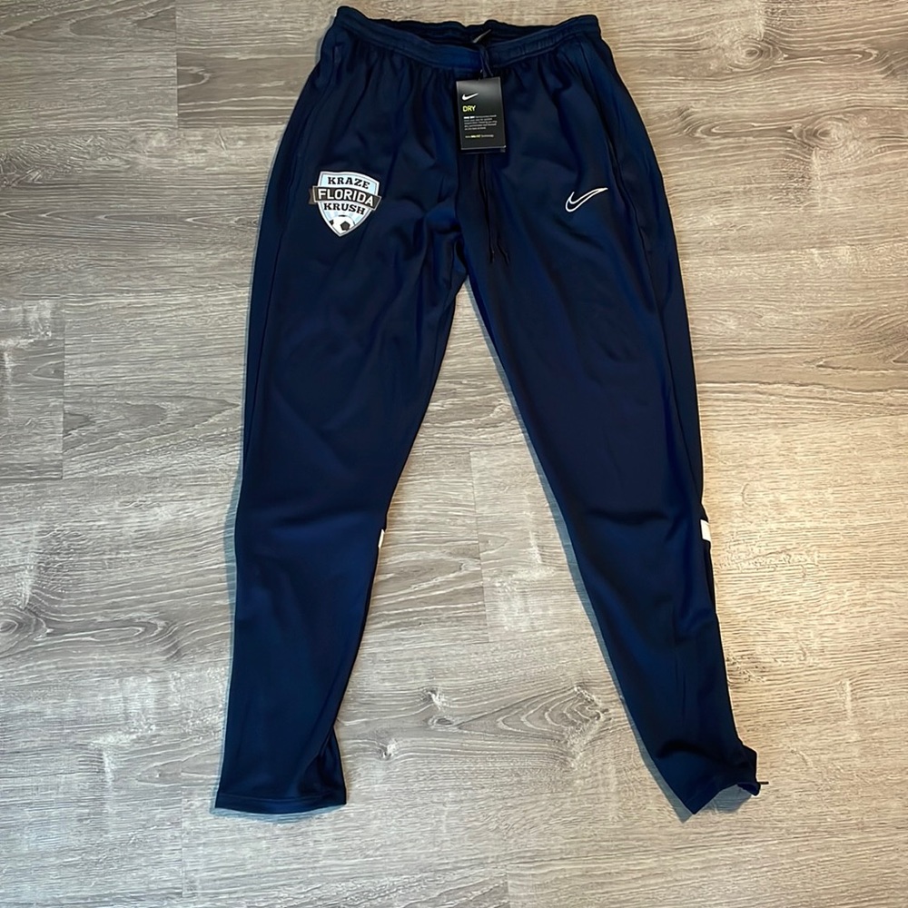 Nike Navy Track Joggers with White Swoosh and Patch